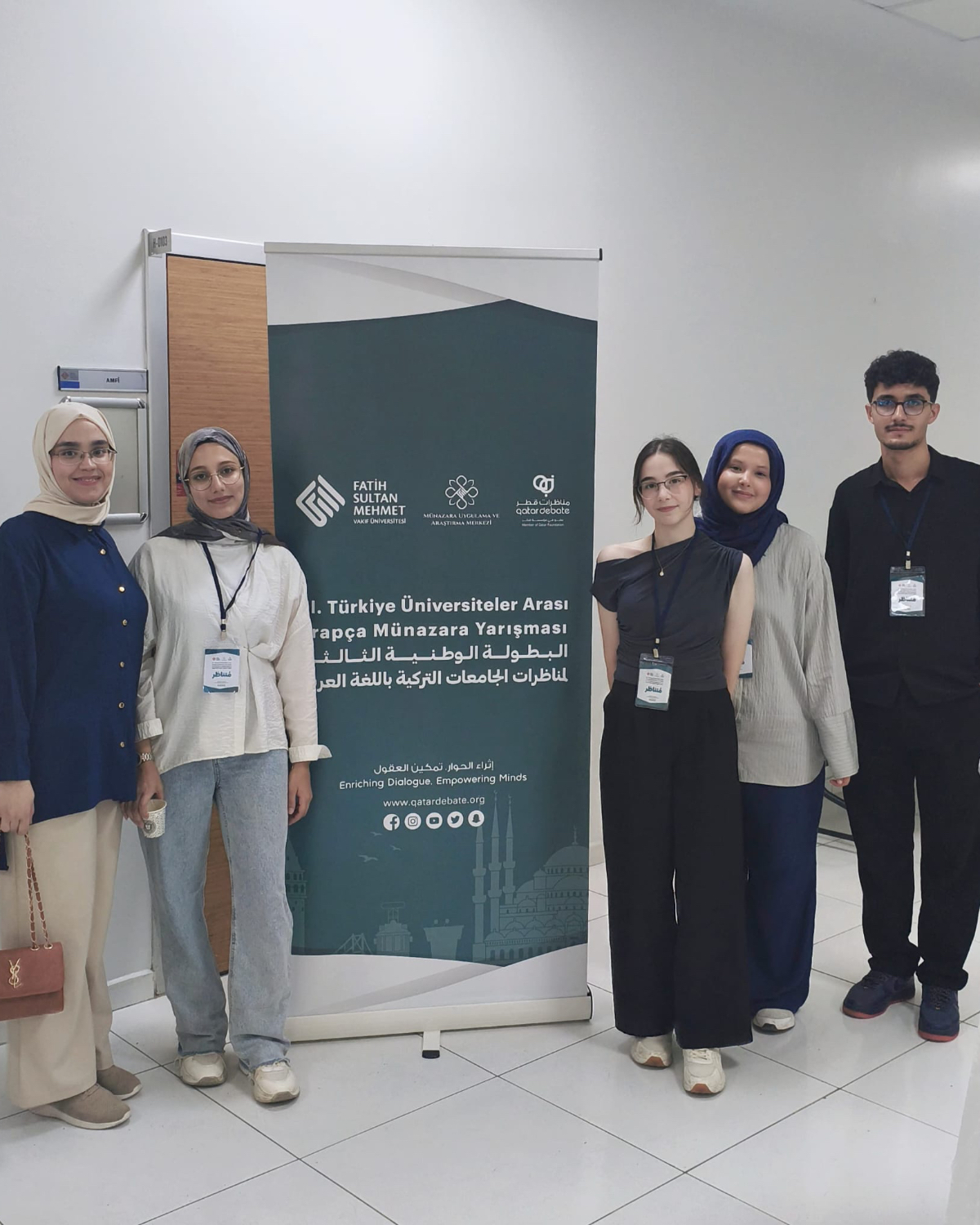 A group photo of our students taken in the competition area. 