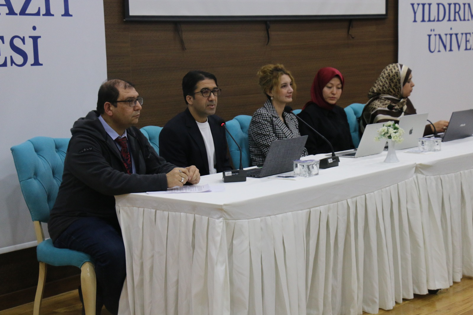 Photo of our faculty members giving presentations on Arabic dialects.